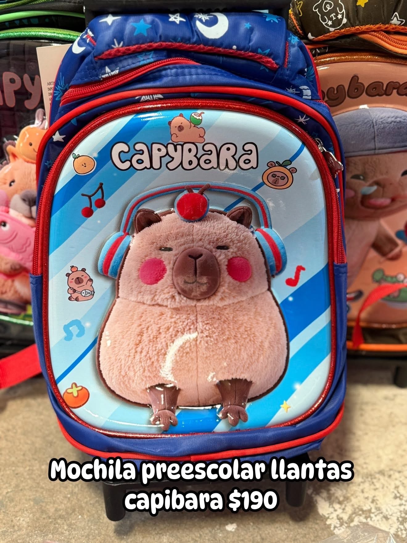 Mochila capibara llanta audifonos
