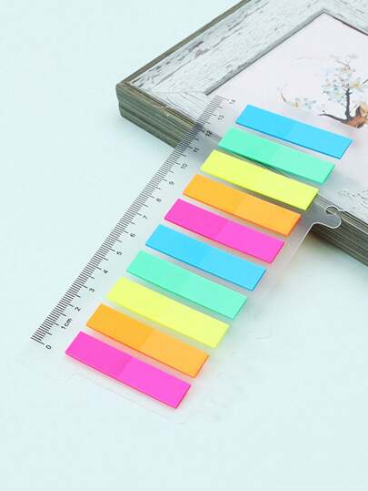 Regla con notas adhesivas